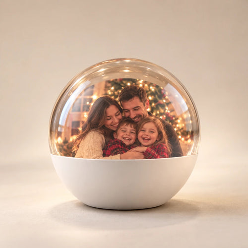 The Heirloom Orb in white, playing a family photo